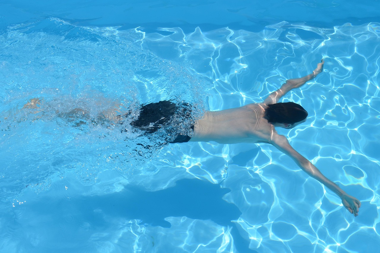 Pool builders resurfacing and rebuilding a backyard pool in Gilbert, AZ